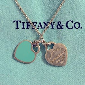 Authentic Tiffany necklace with pouch and box.